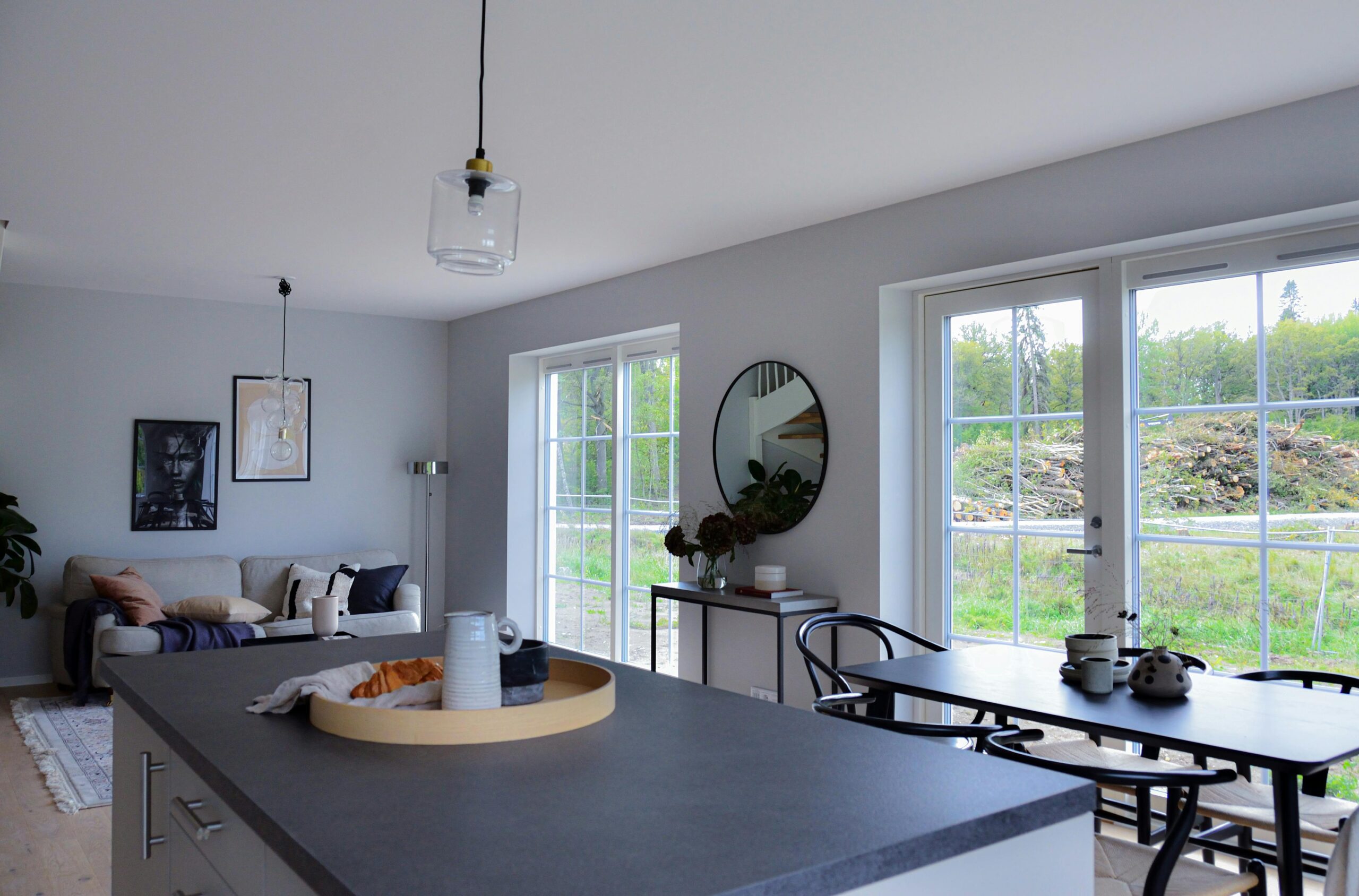 Bright and clean living room with an open window for fresh air circulation in a Orlando home.